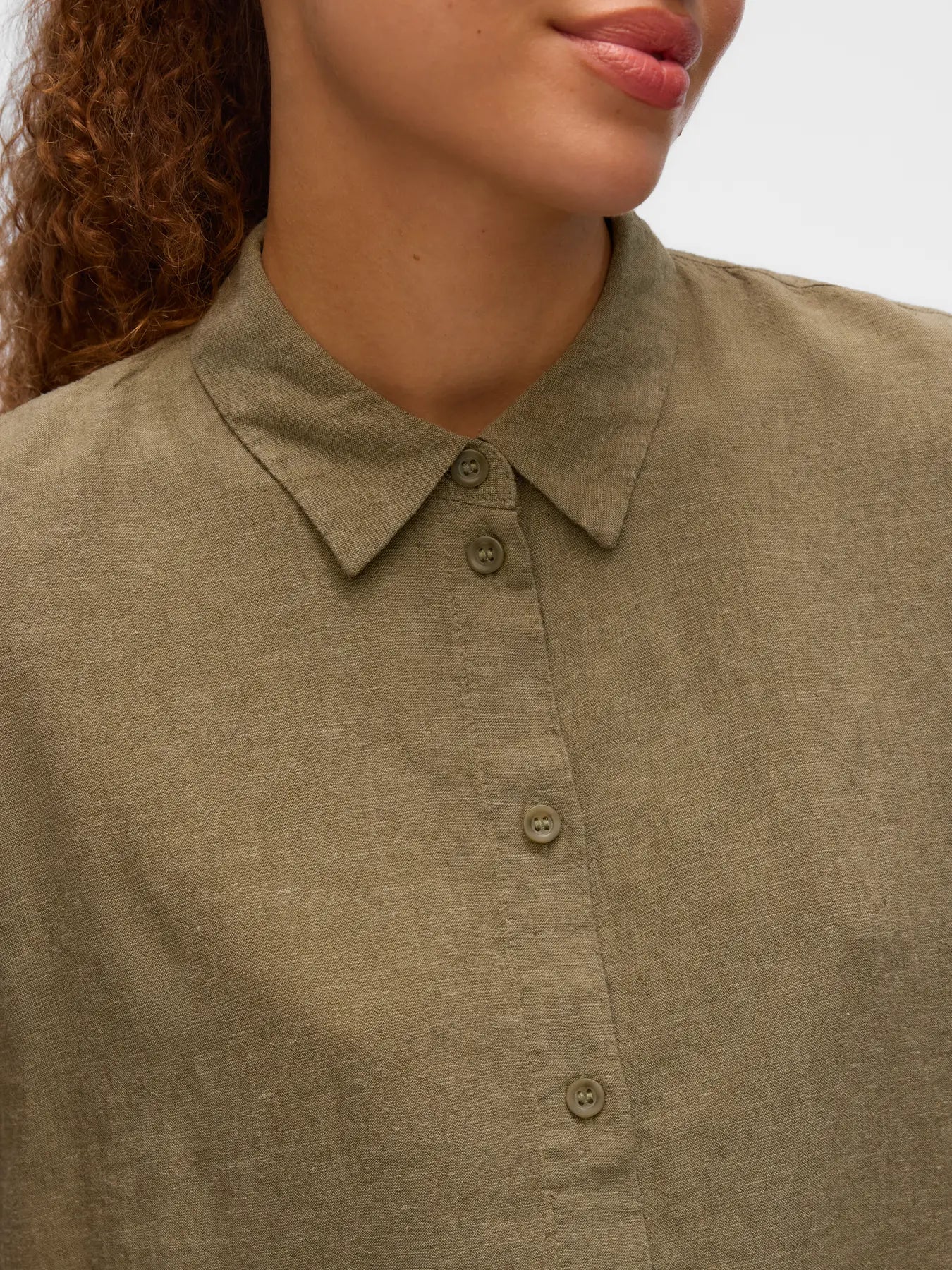 Elegant women's breathable linen-blend collared shirt in olive with button-front styling and relaxed fit for capsule wardrobes and warm-weather dressing.