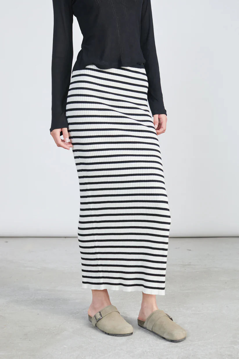 Trendy striped body-hugging maxi skirt with ribbed texture and effortless modern fashion vibe.