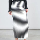 Trendy striped body-hugging maxi skirt with ribbed texture and effortless modern fashion vibe.