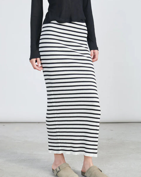 Trendy striped body-hugging maxi skirt with ribbed texture and effortless modern fashion vibe.