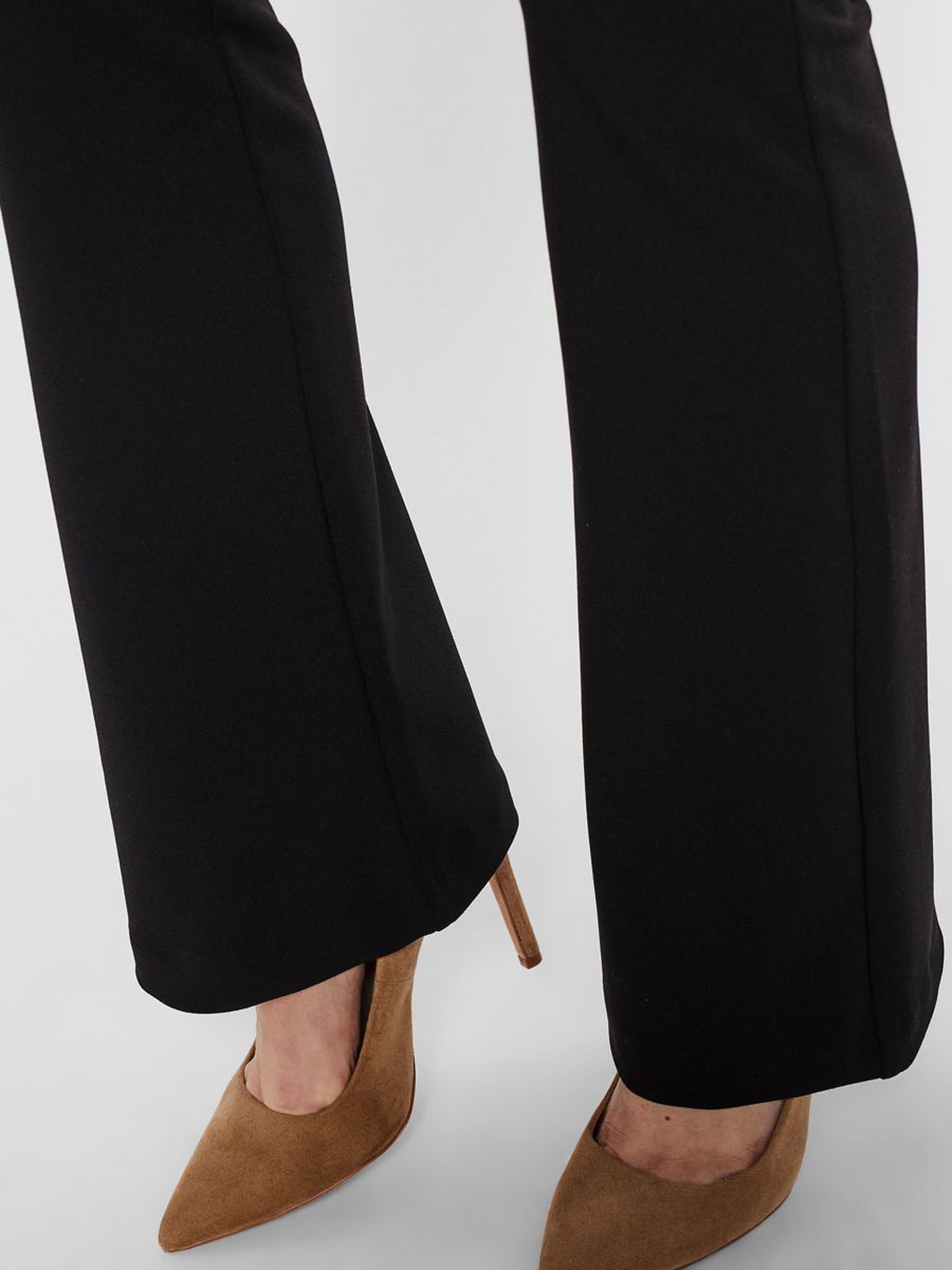 Women's versatile black pants offering a streamlined fit and polished modern appeal.