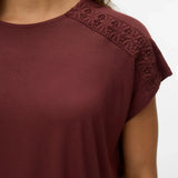 Elegant berry-colored short sleeve fashion top combining modern simplicity with delicate lace shoulder accents and comfortable everyday wear.
