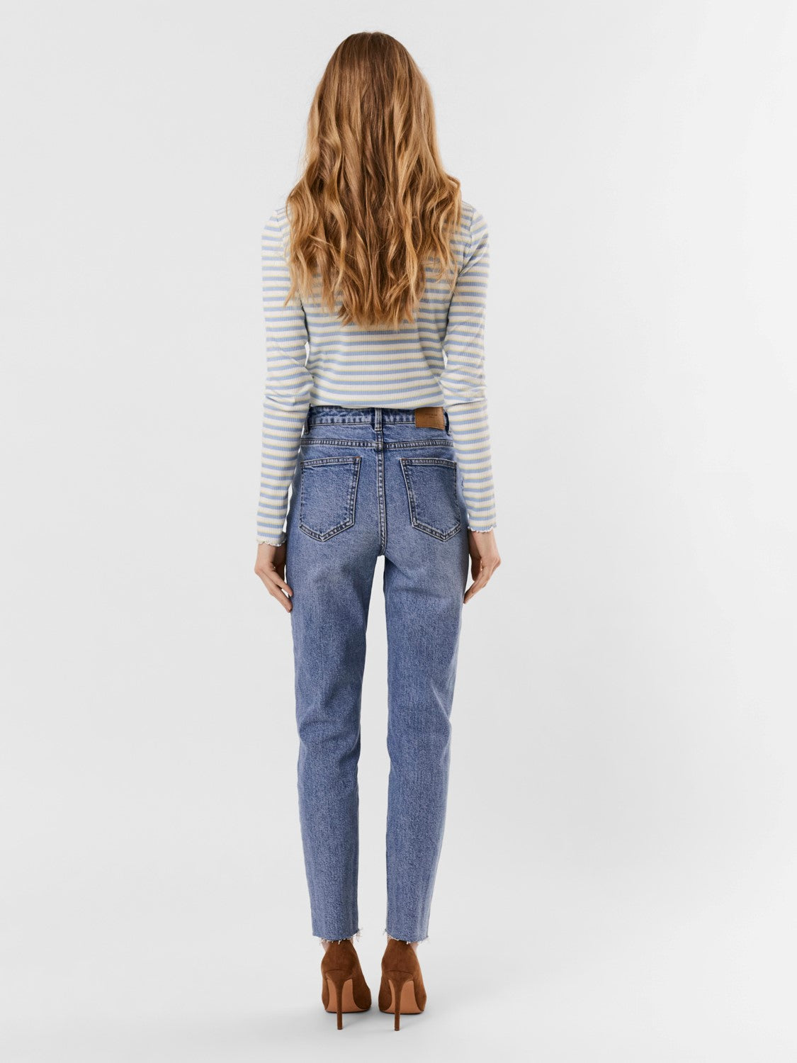 Women's light wash high-rise straight leg jeans with cropped ankle hem and vintage denim wash.