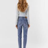 Women's light wash high-rise straight leg jeans with cropped ankle hem and vintage denim wash.