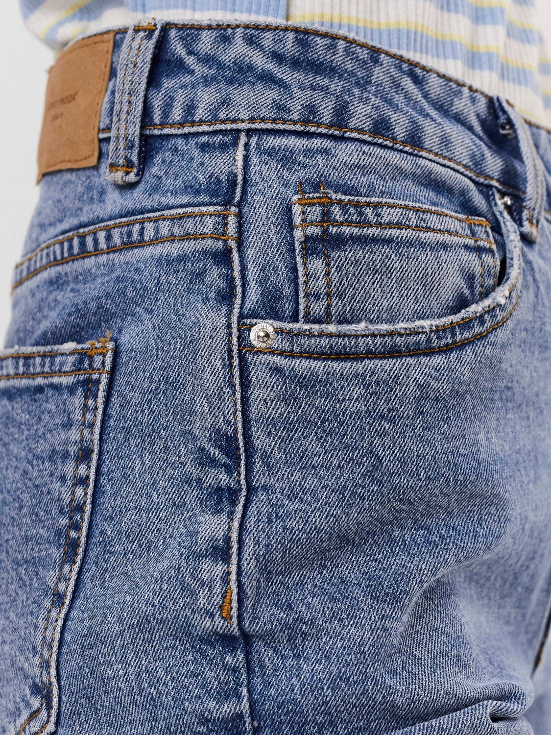 Women's straight leg denim pants with a flattering fit and classic five-pocket construction.