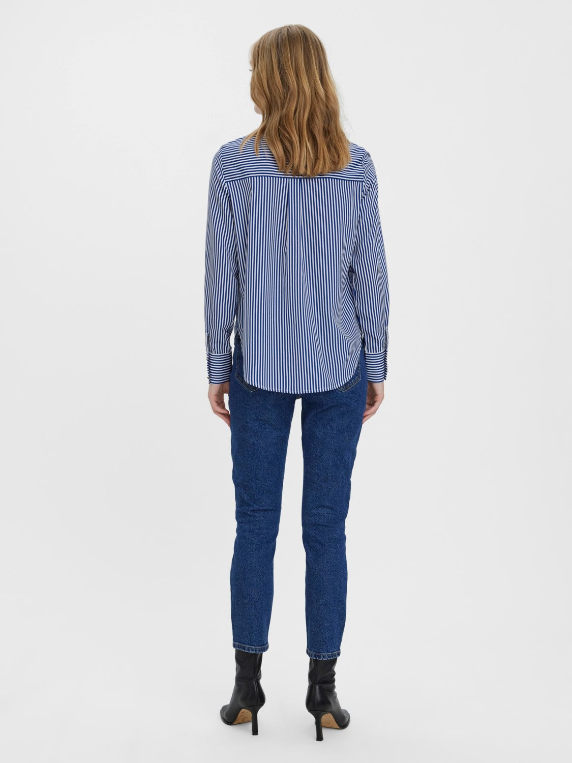 Women's classic denim jeans featuring a streamlined silhouette and polished dark wash color.