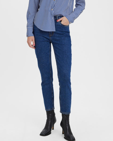 Flattering high-rise jeans in dark indigo denim for casual chic and elevated basics.
