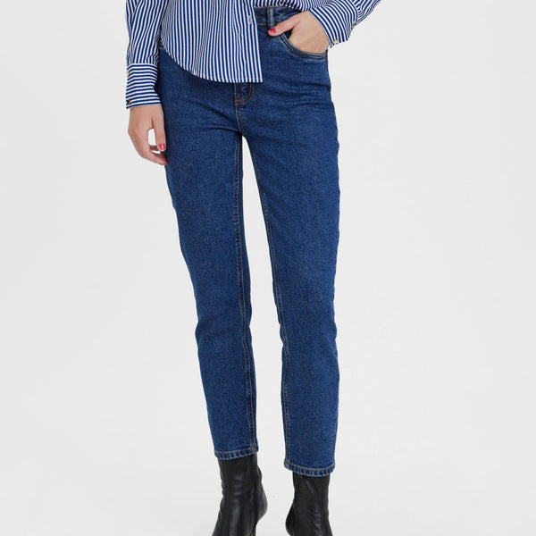 Flattering high-rise jeans in dark indigo denim for casual chic and elevated basics.