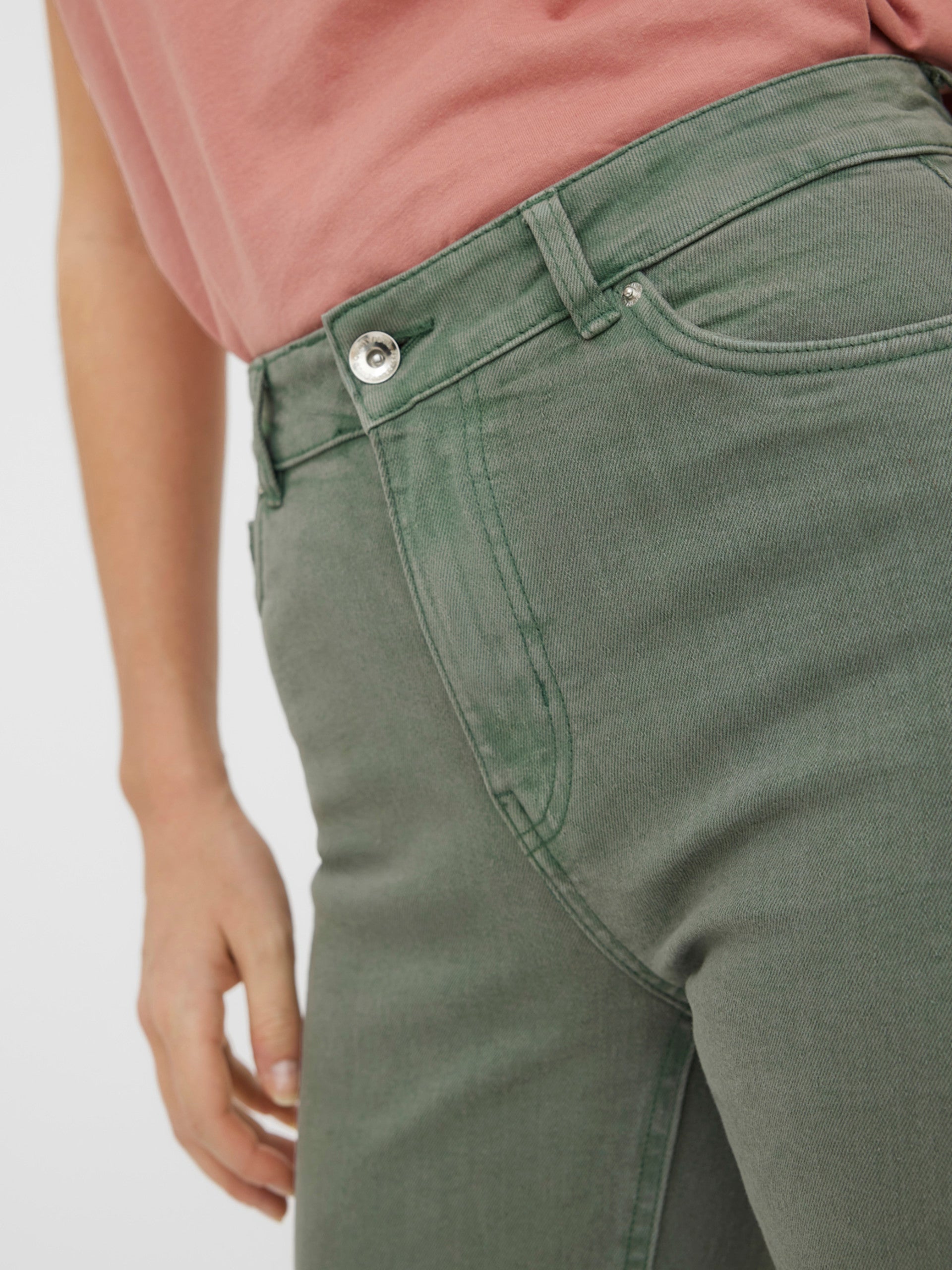 Women's cropped ankle jeans in sage green with classic five-pocket denim construction.