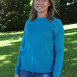 Women's minimalist teal blue sweater with effortless elegance and everyday comfort.