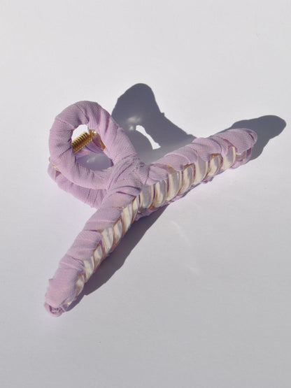 Fabric-wrapped oversized claw clip for thick hair and effortless styling.