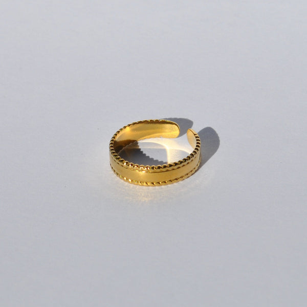 Minimal gold adjustable ring for women featuring modern sculptural design and timeless everyday elegance.