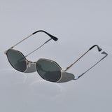 Women’s lightweight gold sunglasses with angular hexagon silhouette and UV400 gradient lenses for timeless stylish looks.