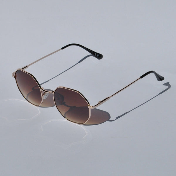 Modern geometric sunglasses for women with slim gold metal frames and trendy oversized hexagon lens shape.