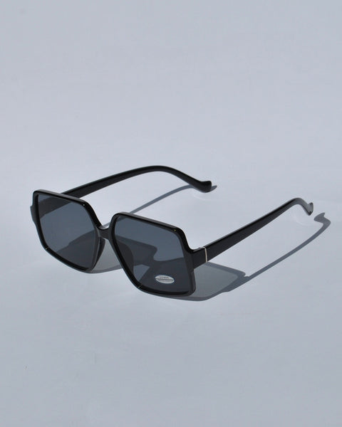 Women’s bold black sunglasses with oversized square frames and contemporary designer-inspired look for summer fashion.