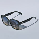 Designer-style women’s sunglasses with chunky green square frames and gradient UV400 lenses for contemporary accessory trends.
