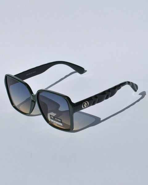Designer-style women’s sunglasses with chunky green square frames and gradient UV400 lenses for contemporary accessory trends.