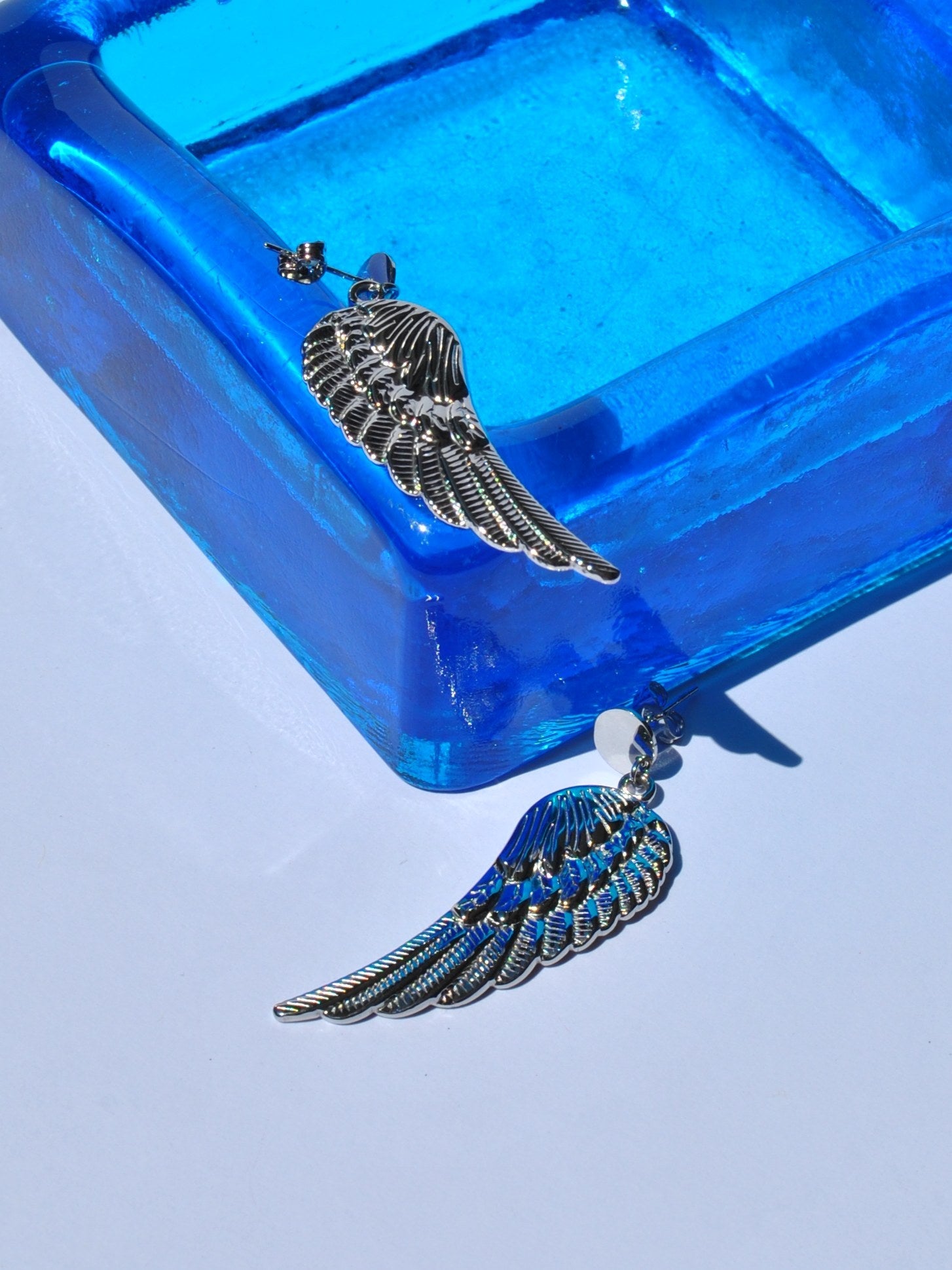 Elegant gold angel wing jewelry earrings with lightweight dangling design for stylish women’s accessories.