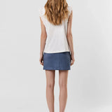 Women's embroidered sleeveless blouse with delicate eyelet flutter sleeve detail.
