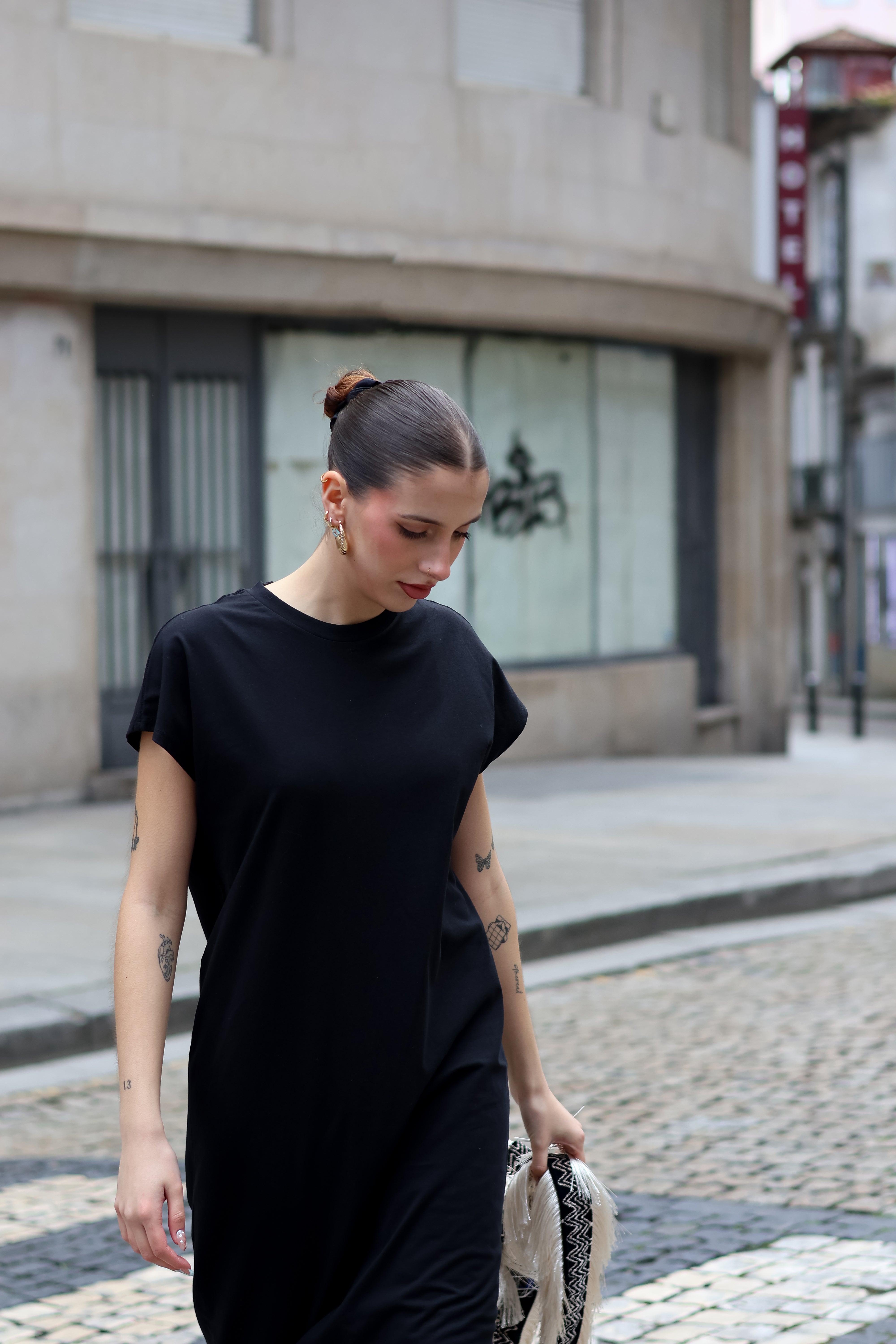 Trendy women’s relaxed-fit black lounge dress with modern clean-girl fashion and sporty luxe vibe.