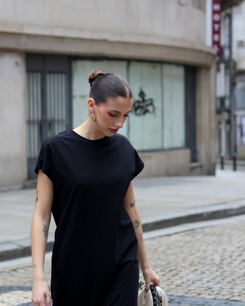 Trendy women’s relaxed-fit black lounge dress with modern clean-girl fashion and sporty luxe vibe.