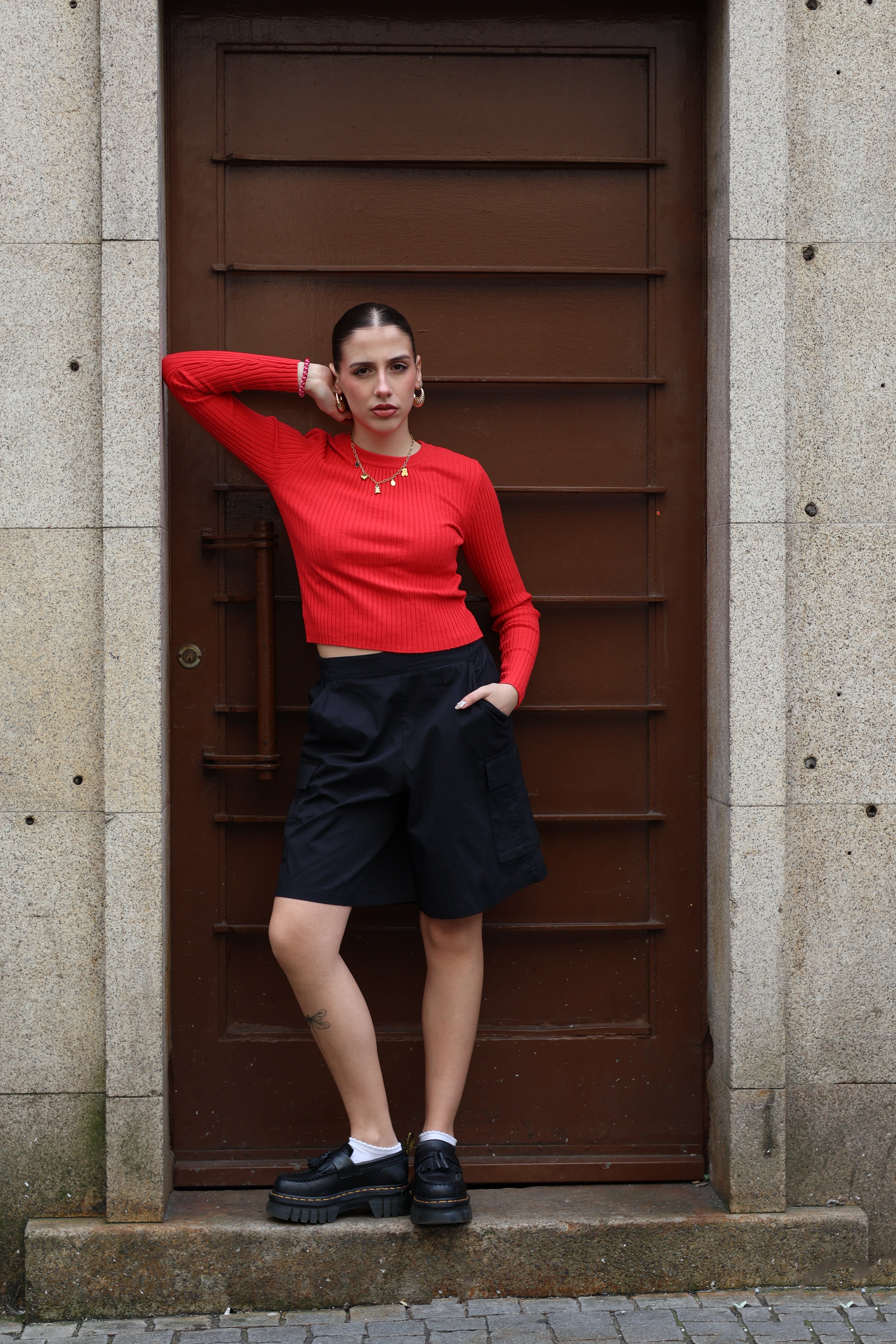 Boutique-style ribbed sweater for women with flattering fitted design and elevated street fashion look.