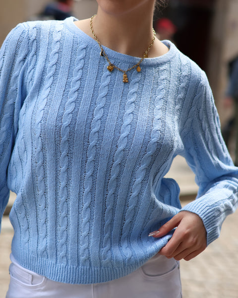 Cozy oversized cable knit sweater in soft sky blue with timeless preppy fashion aesthetic.