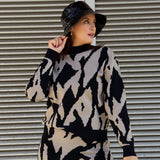 Stylish black rain bucket hat with glossy finish and modern lightweight designer-inspired fashion look.