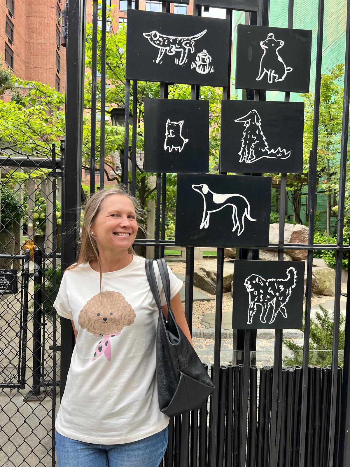 Women’s casual street-style look with playful dog graphic cotton tee   inNew York City