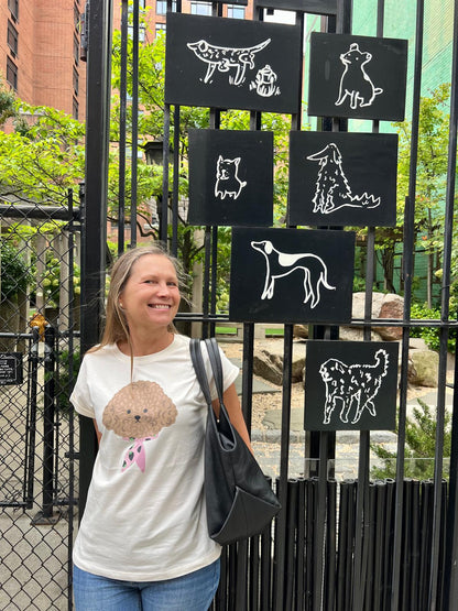 Women’s casual street-style look with playful dog graphic cotton tee   inNew York City
