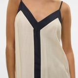 Boutique-style spaghetti strap maxi dress with contemporary monochrome design and relaxed sophistication.