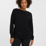Relaxed fit black knit sweater perfect for layering with jeans, trousers, and skirts.