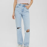 Women's relaxed fit denim jeans featuring a faded wash and modern distressed accents.