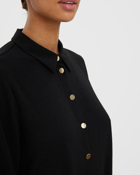 Black button-up blouse offering effortless elegance for office outfits and everyday fashion.