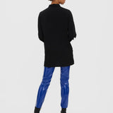 Chic black oversized shirt designed for effortless styling with jeans, leggings, or tailored pants.