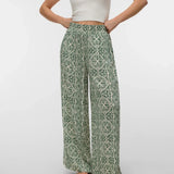 Relaxed fit bohemian trousers with an abstract geometric pattern and full-length design.