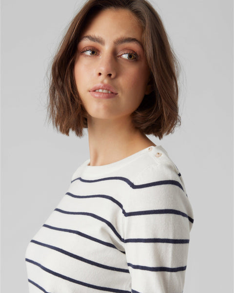 Long sleeve striped sweater with modern tailoring and Parisian-inspired fashion details.