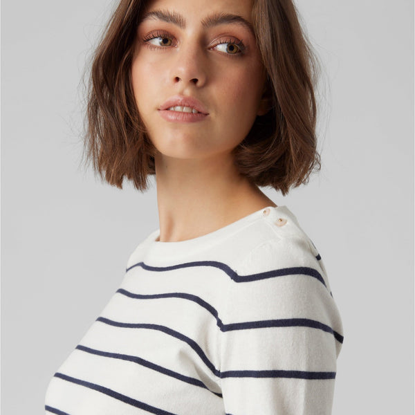 Long sleeve striped sweater with modern tailoring and Parisian-inspired fashion details.