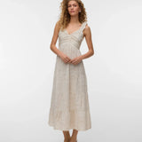 Women's ivory sleeveless midi dress featuring a textured botanical print, ruched bodice, ruffle shoulder straps, and flowing tiered skirt for timeless summer elegance.