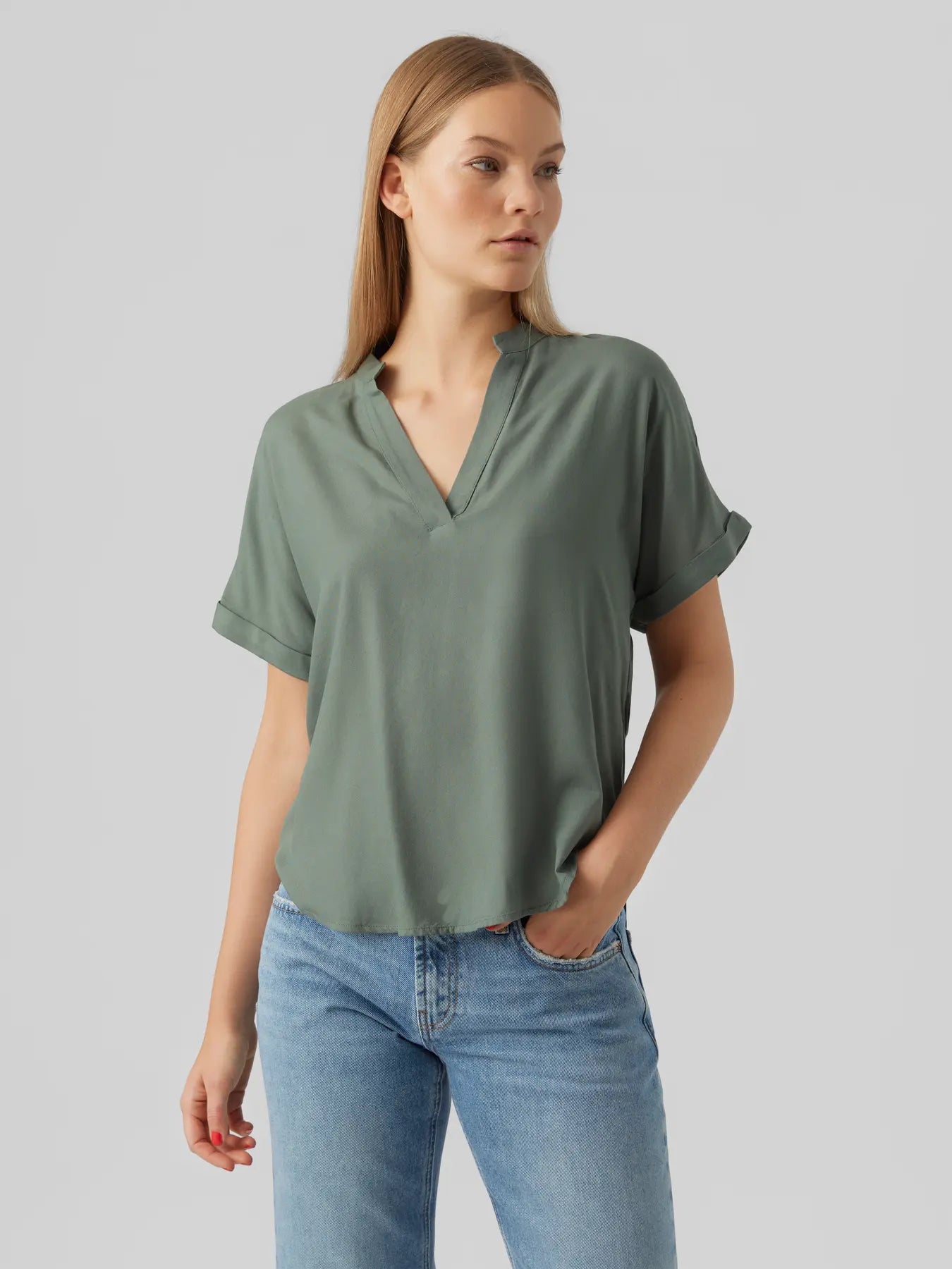 Women's sage green V-neck blouse with short rolled sleeves, relaxed fit and lightweight drape for effortless everyday and business casual style.