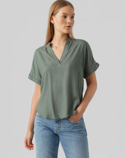 Women's sage green V-neck blouse with short rolled sleeves, relaxed fit and lightweight drape for effortless everyday and business casual style.