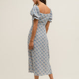 Women's vintage-inspired floral midi dress with timeless romantic detailing.