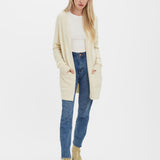 Soft ivory knit cardigan featuring a relaxed silhouette and practical pocket details.
