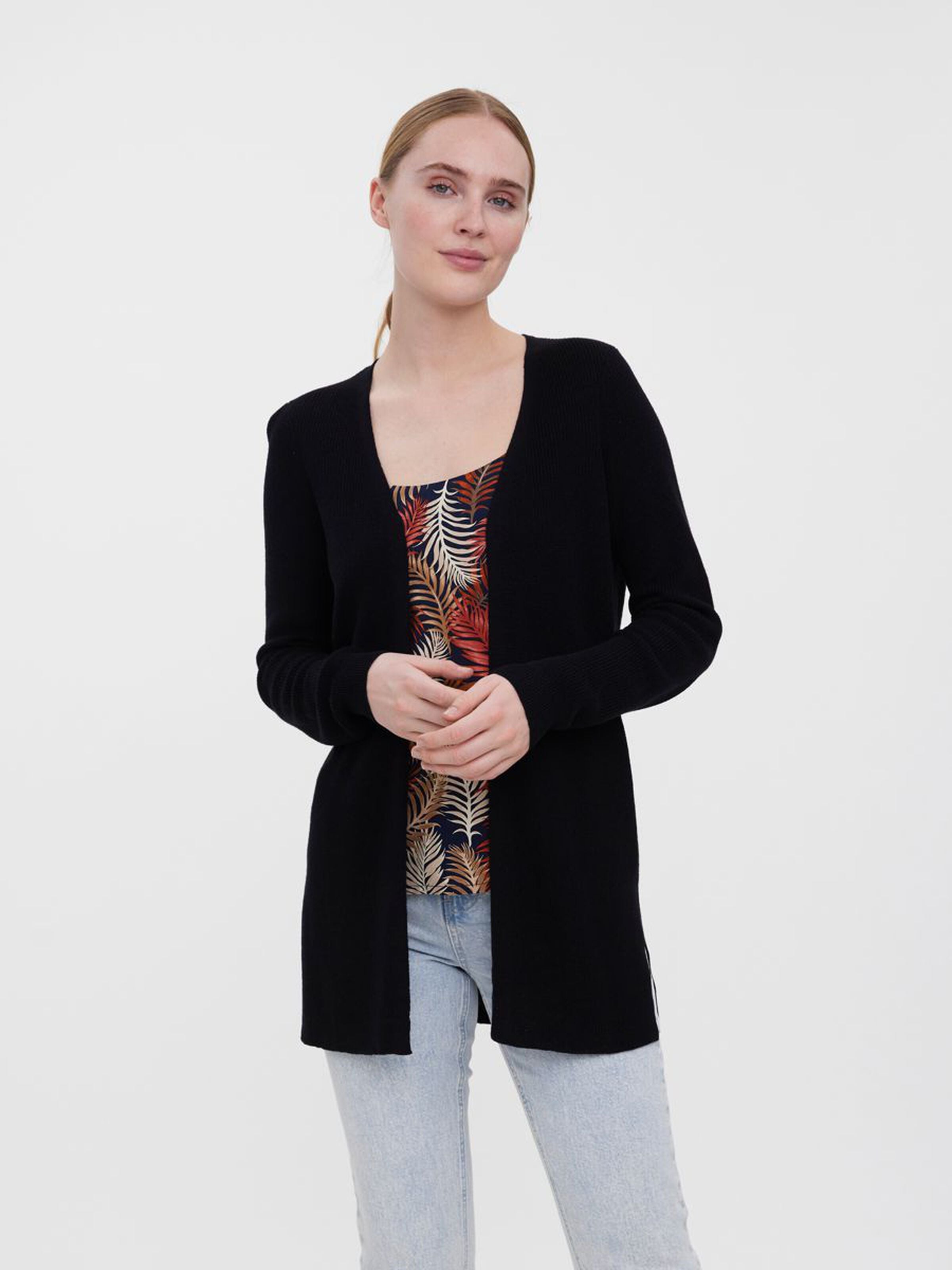 Classic black knit Cardigan layering piece perfect for pairing with tanks, tees, blouses, and dresses.