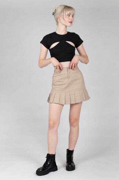 Trendy black crop top featuring chest cutouts and soft stretch fabric.