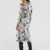Fashion-forward floral bodycon midi dress with long sleeves and colorful painterly print for elevated everyday elegance.