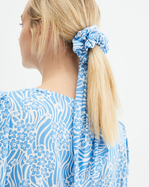 Floral print scarf hair tie in blue designed for modern boho fashion.