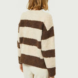 Soft boucle stripe sweater for women with oversized fit and cozy Scandinavian-inspired winter fashion.