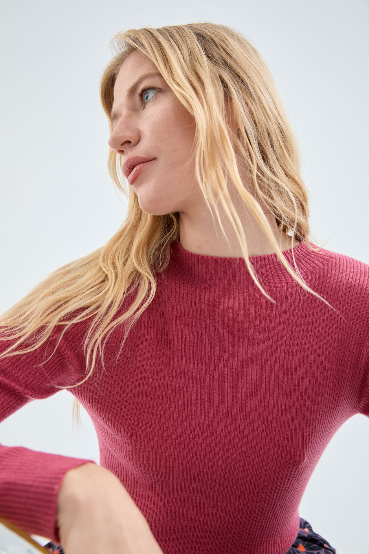 Classic pink coral ribbed pullover sweater featuring soft stretch knit fabric and timeless modern women’s styling.