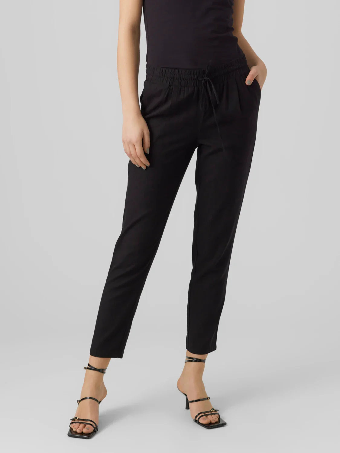 Women's casual black trousers perfect for work, travel, and everyday wear.